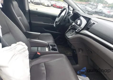 2018 Honda Odyssey Elite z USA, uszkodzony, nr VIN 5FNRL6H97JB025422